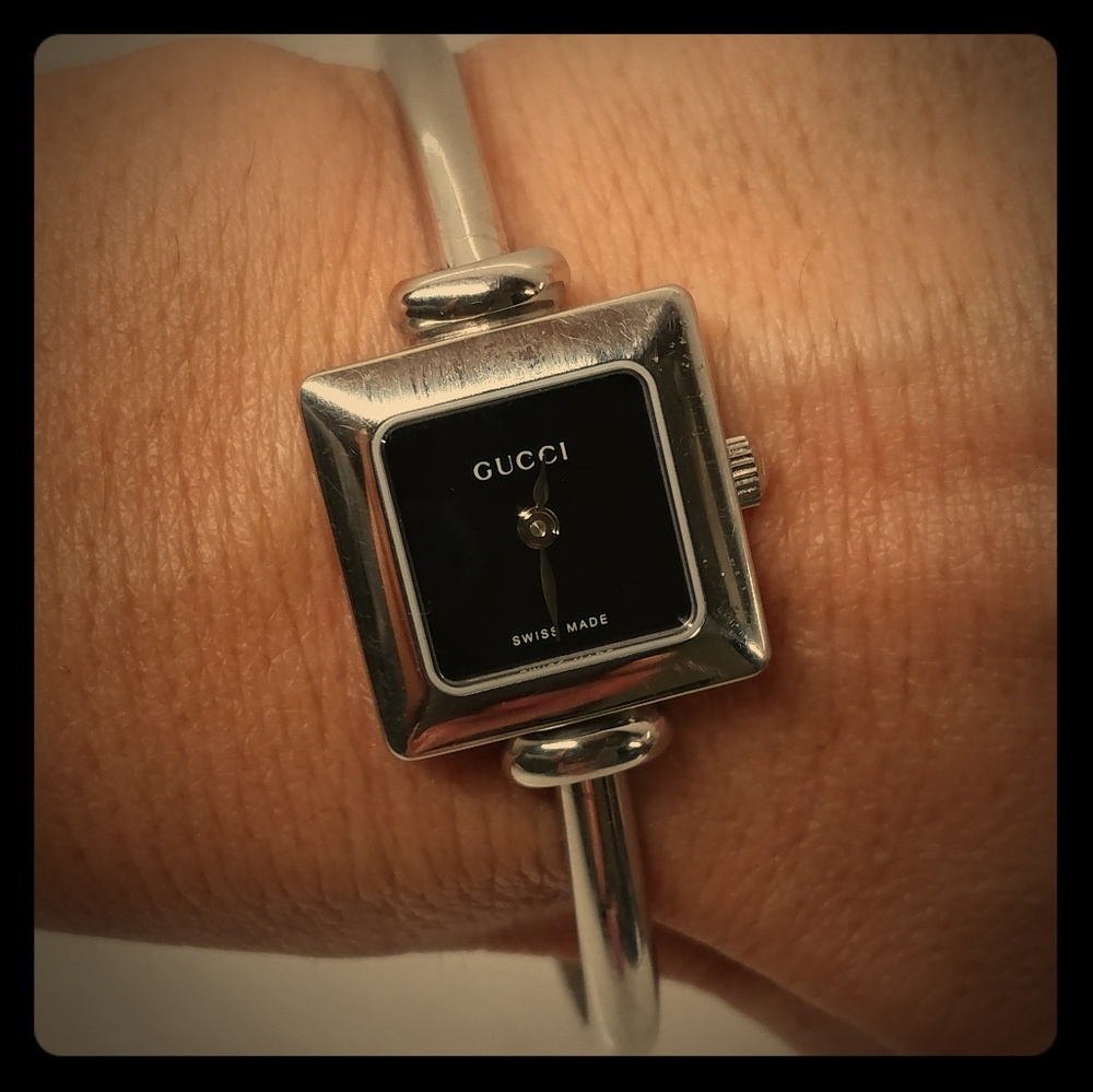 Wrist watch - it says Gucci